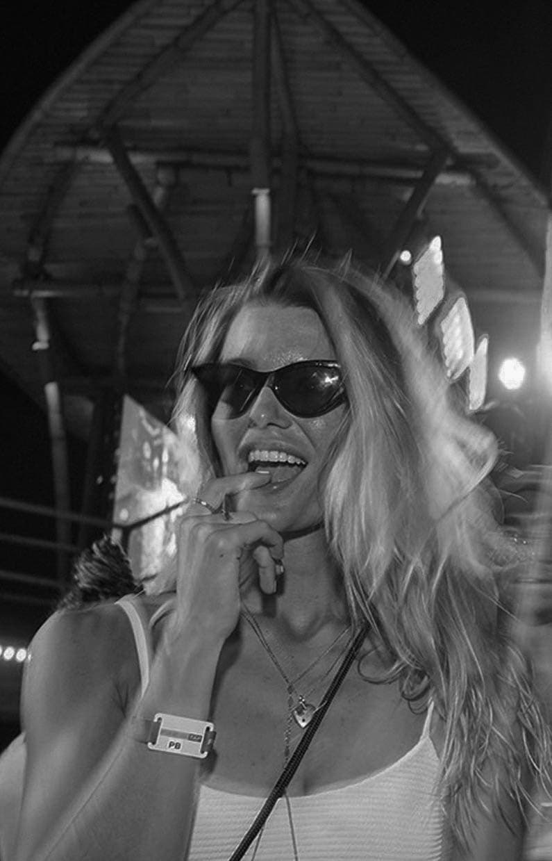 A woman enjoying night party at Finns